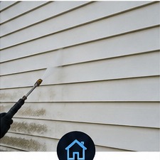 Pressure washing an exterior surface